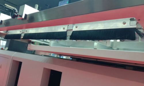 brush under paper tray of blanking machine